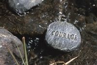 Courage carved on a rock