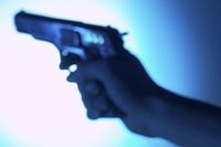 Aiming handgun photo